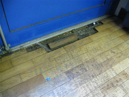 We managed to source the correct wood blocks to the ones present and repair this section. In an entrance area like this we recommend using entrance matting to control soil.