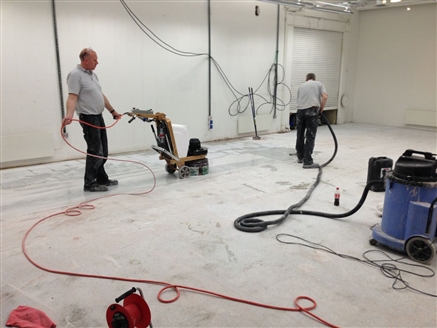 Once the paint and other contamination is removed, we cary on grinding and polishing to build up a shine on the floor.