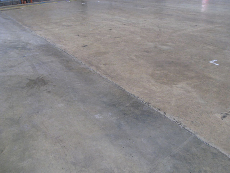 Cleaning Concrete Floor in Warehouse
